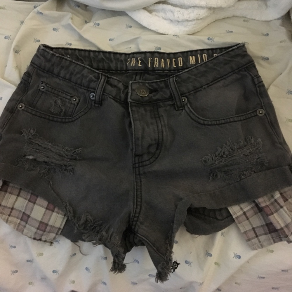 flannel and denim shorts